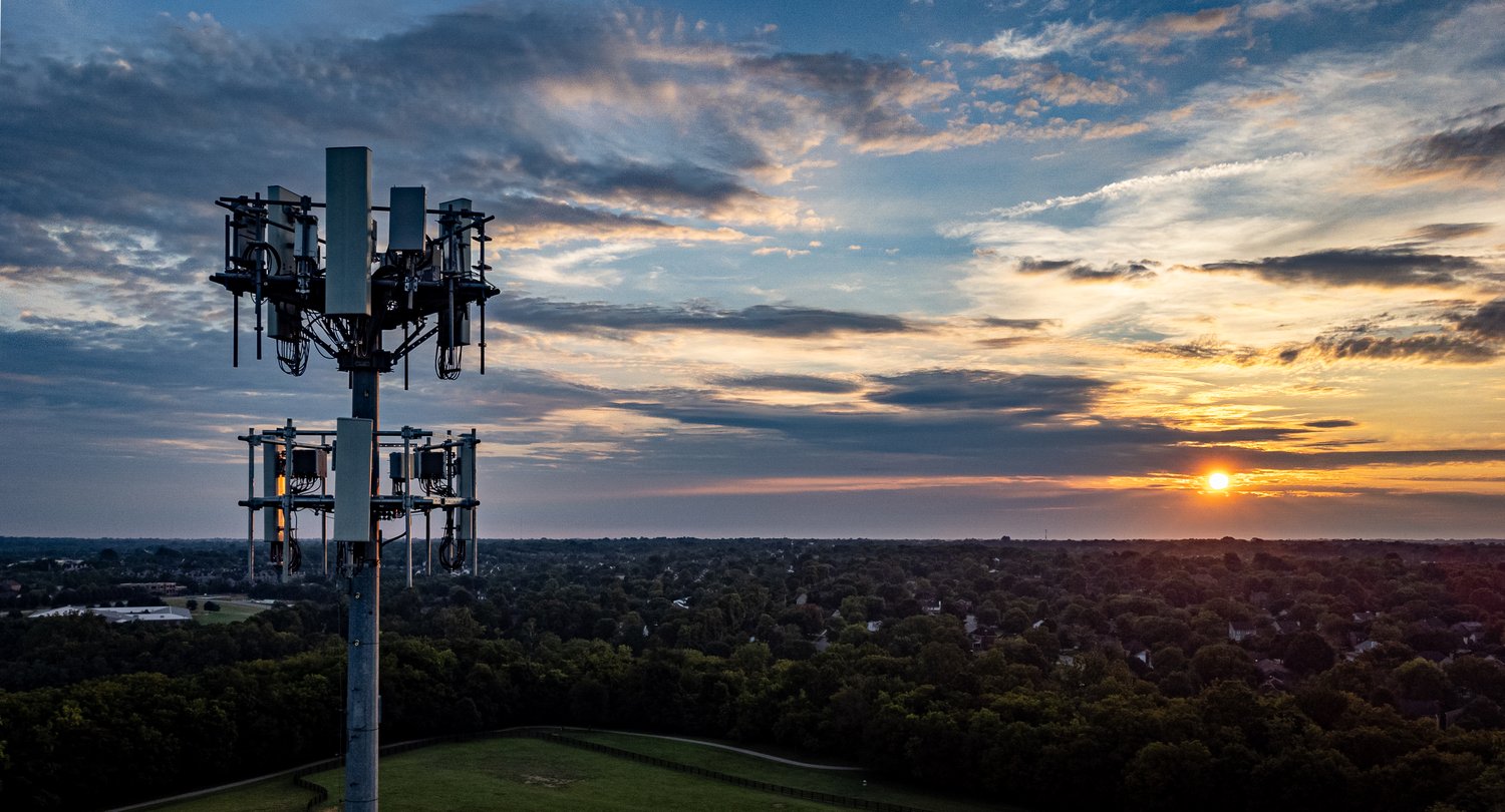 Cellular tower with sunset in the background
